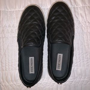 Black Steve Madden slip ons